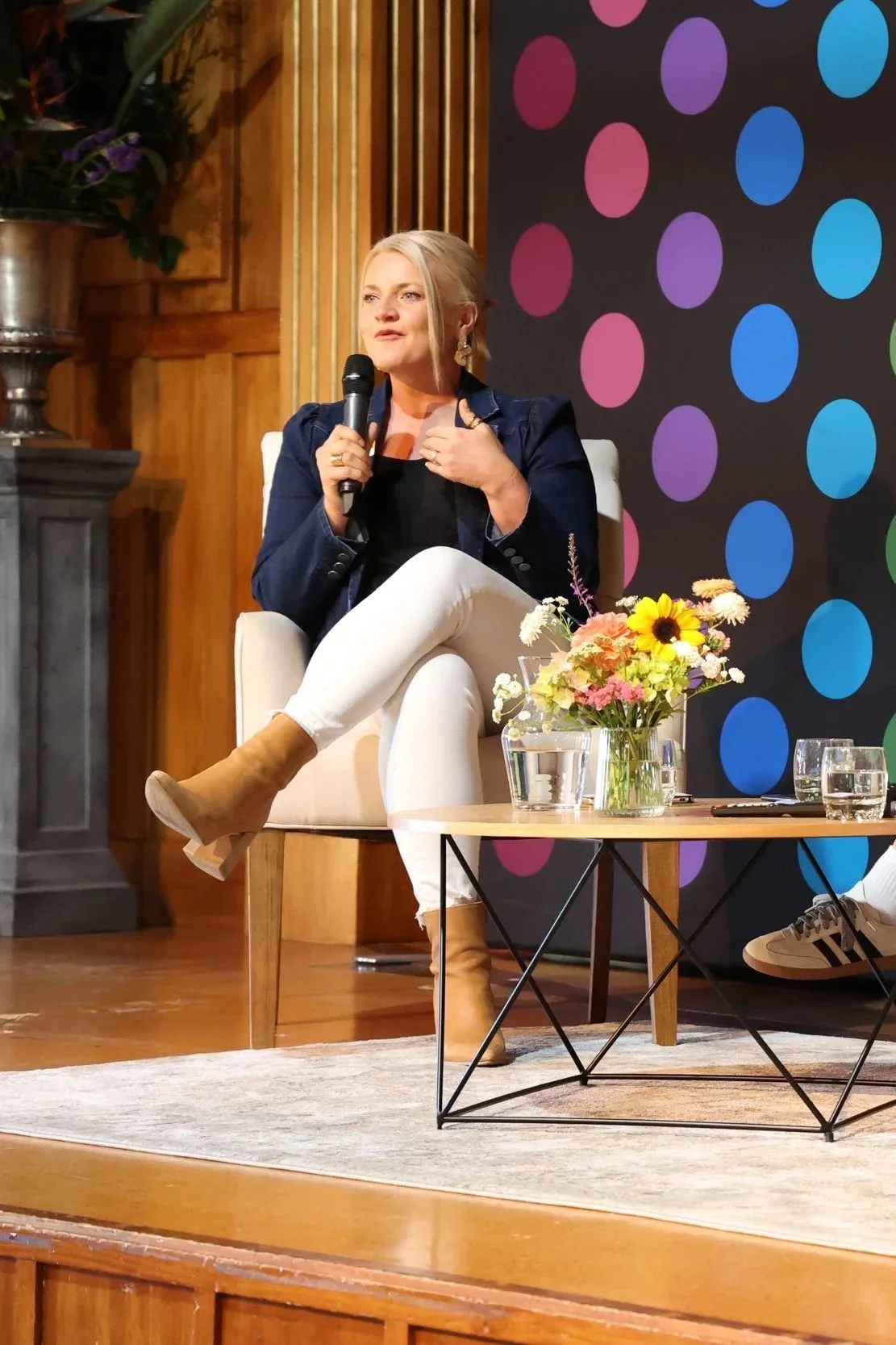 Kristen Enright speaking on stage